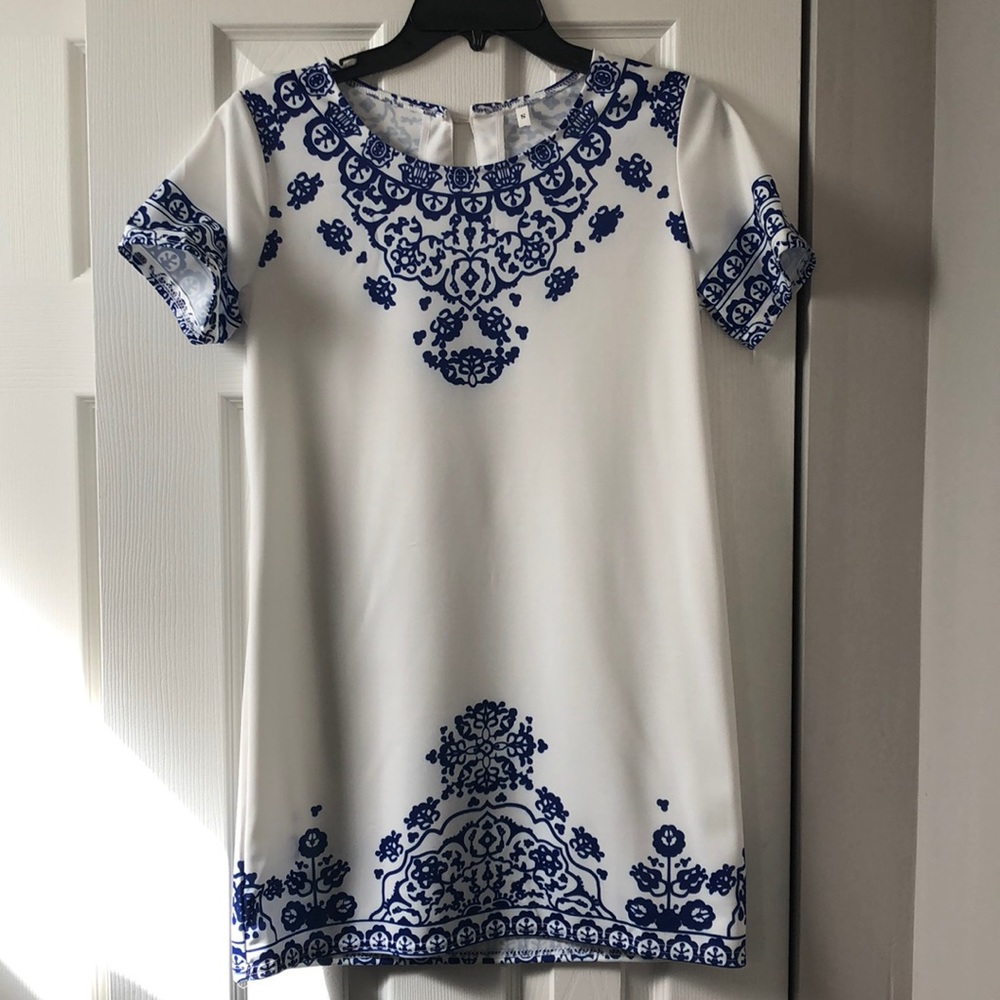 White dress with blue coral designs